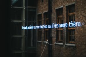 Output Interference: Why Recalling Memories Blurs Others
